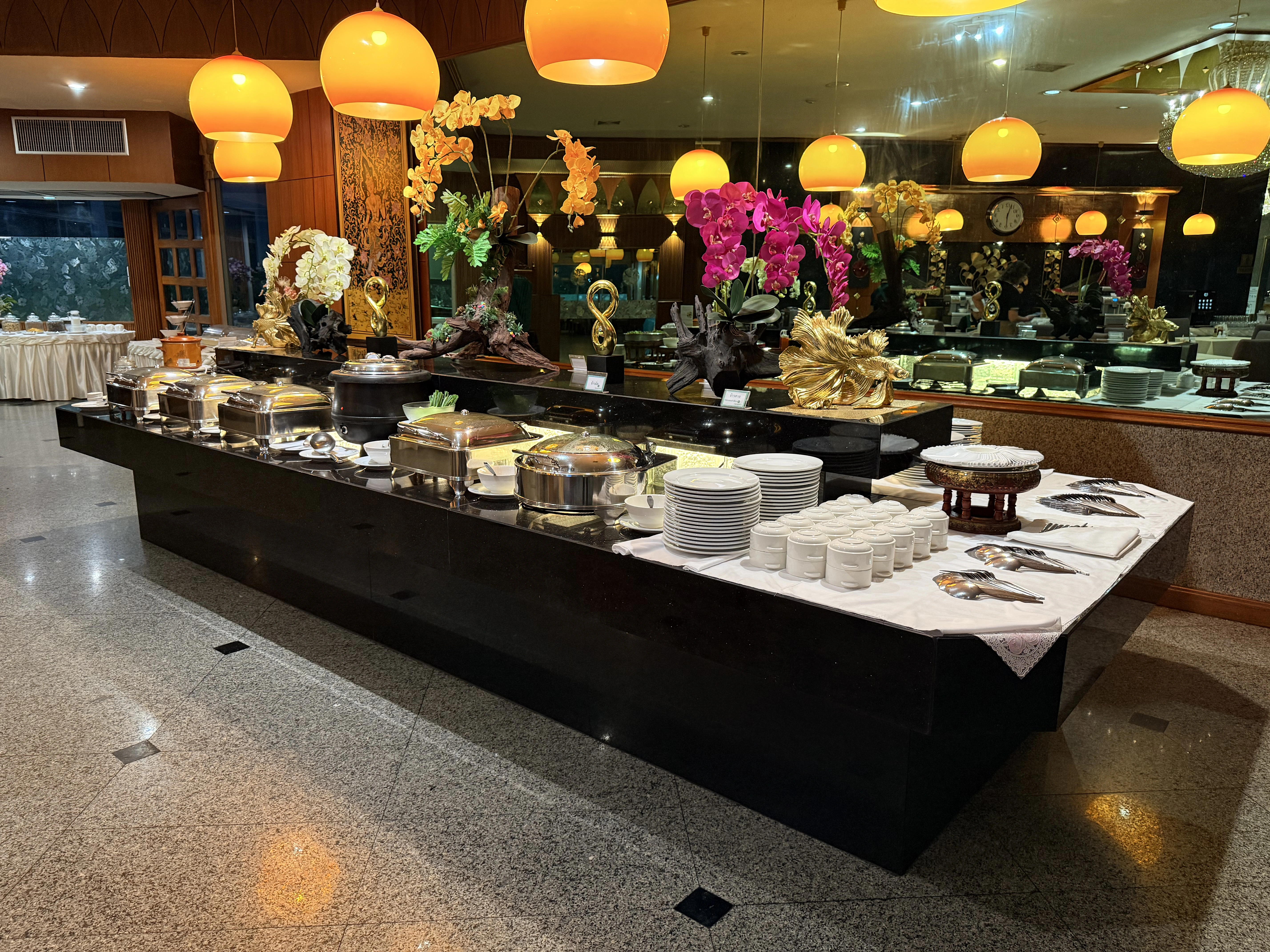 The breakfast room set for the morning buffet