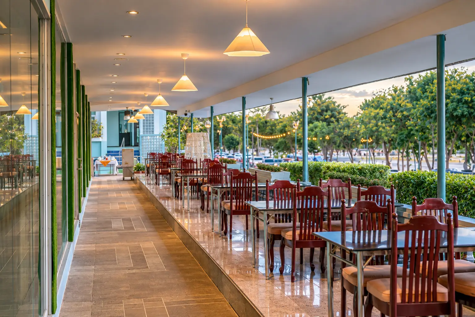Rim Ping Terrace restaurant, set with tables beside the river